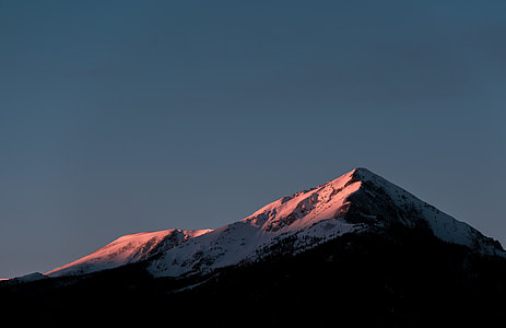 snow covered mountain during daytime thumbnail