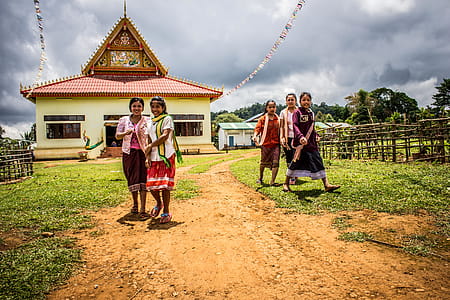 Five Women Walking on Green Grasses thumbnail