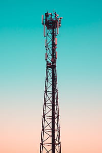 black metal tower under clear sky thumbnail