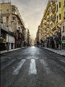 gray roadway between buildings thumbnail
