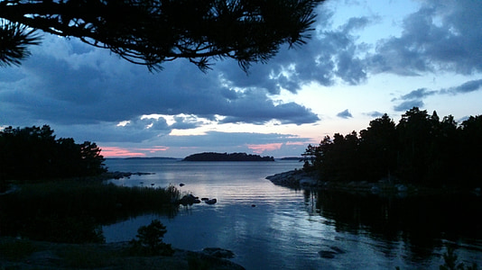 body of water during sunset thumbnail