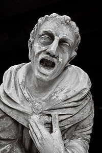 stone statue of screaming man thumbnail