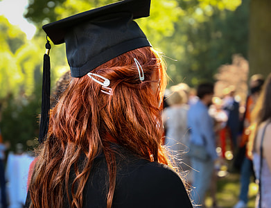focus photo of woman in academic gown thumbnail