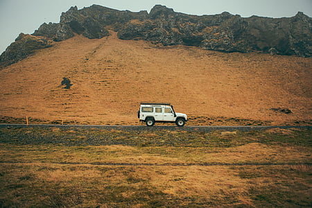 white Land Rover Discovery on asphalt road thumbnail