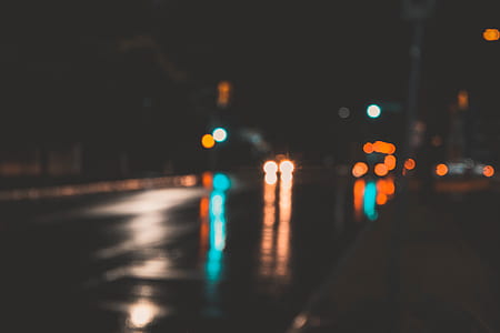 bokeh photography of car lights on road thumbnail