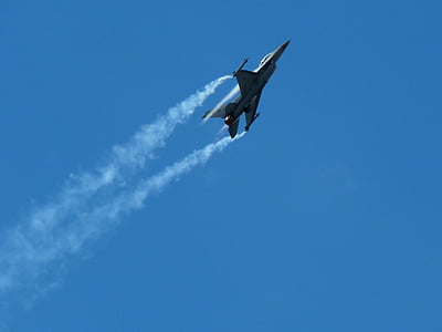 plane flying on sky thumbnail