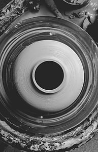grayscale photo of clay pot molding thumbnail
