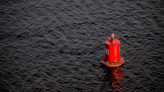 red lifesaver on body of water thumbnail