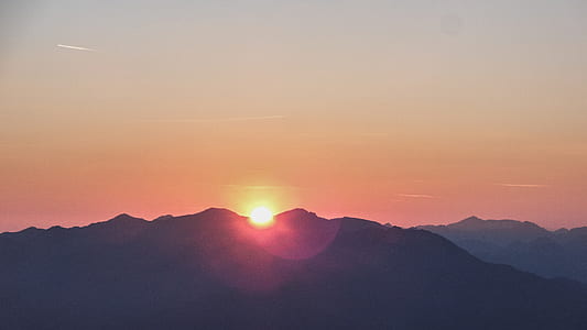 sun peeping on mountain thumbnail