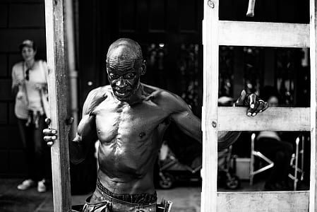 grayscale photography of topless man thumbnail