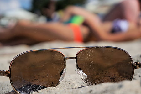 brown Aviator sunglasses on sand thumbnail