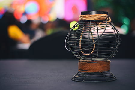 Selective Focus Photograph Od Black and Brown Metal Candle Lantern thumbnail
