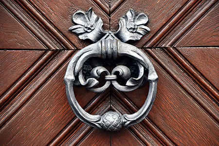 closeup photo of gray metal door knocker thumbnail