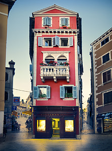 pink and beige concrete building thumbnail