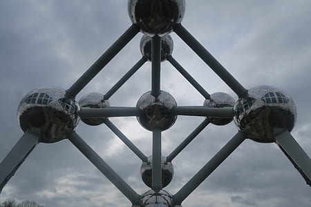 gray stainless steel monument under clouded sky at daytime thumbnail