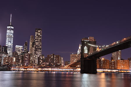 low angle photo of Brooklyn Bridge at nightime thumbnail