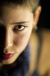 selective focus photography of a woman face thumbnail