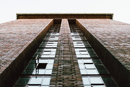 brown high-rise concrete building thumbnail
