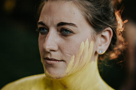 woman with paint on face thumbnail