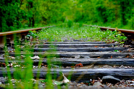 closed up photo of brown and black train railway thumbnail