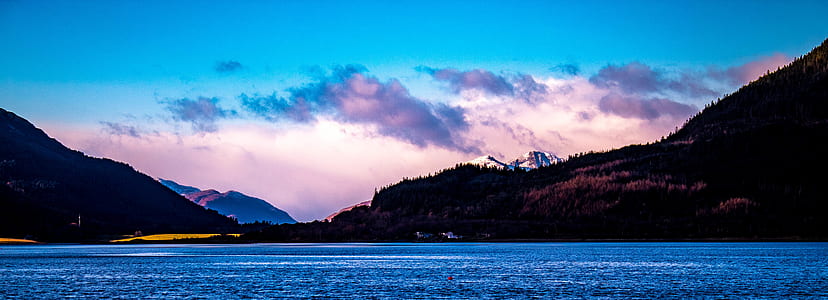 Body of Water during Sunrise thumbnail