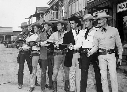 graysale photo of men holding rifles thumbnail