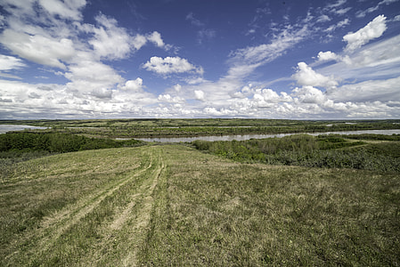 Hill and River under the Skies in Saskatchewan thumbnail