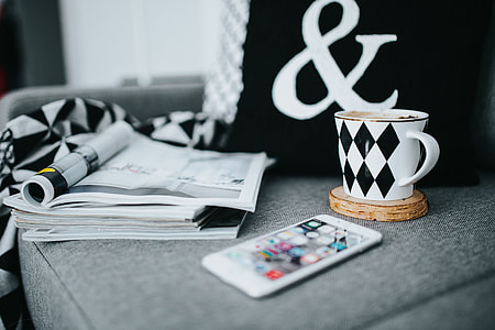 Resting with magazines and cup of coffee thumbnail