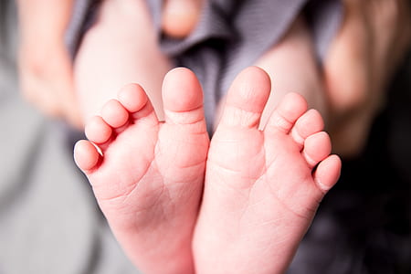 close up photo of toddler's feet thumbnail