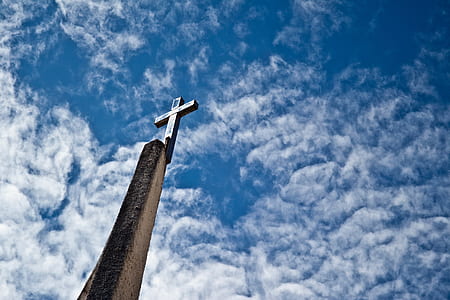photo of gray cross during daytime thumbnail