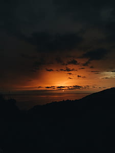 mountain under black sky thumbnail