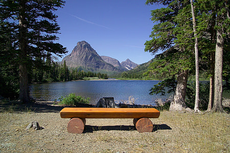 Bench viewing the wilderness landscape at Glacier National Park, Montana thumbnail