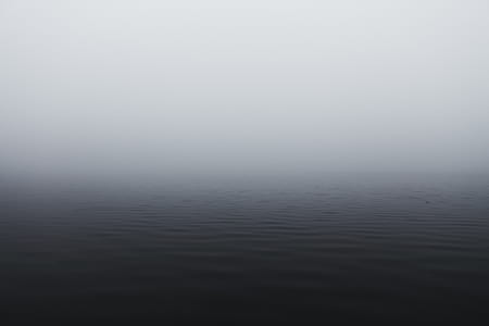 body of water covered with fogs thumbnail