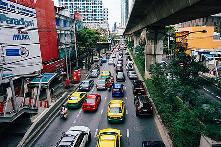 cars on asphalt road during daytime thumbnail