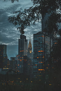 silhouette photo of Chrysler building under gloomy sky thumbnail