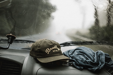 tilt-shift photography of cap and shirt thumbnail