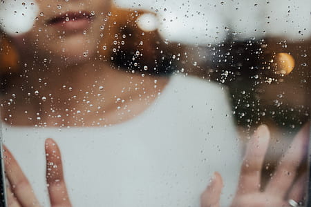 woman behind clear glass wall thumbnail