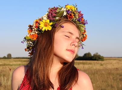 woman wearing floral head dress thumbnail
