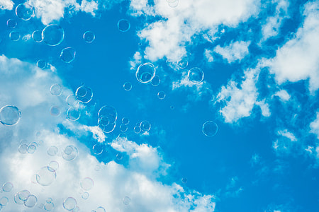 Thousands of Bubbles Against Bright Blue Sky thumbnail