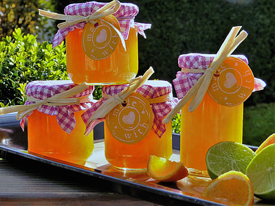 four clear glass jars on top of tray thumbnail
