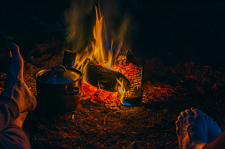 stainless steel pot near bonfire thumbnail