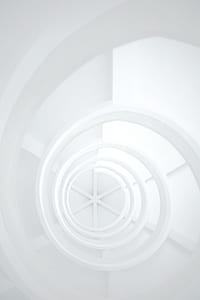 aerial photography of spiral white stairs thumbnail