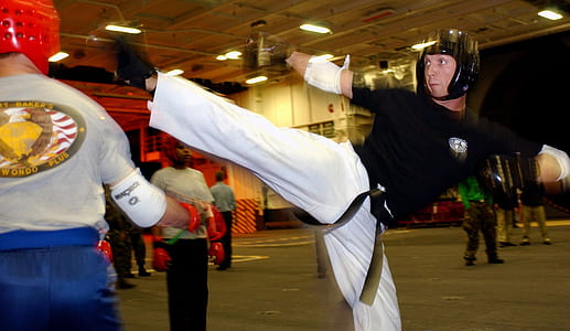 man kicking sparring partner thumbnail