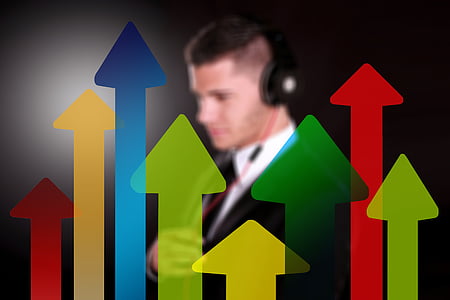 man wearing headphones with up arrow background thumbnail