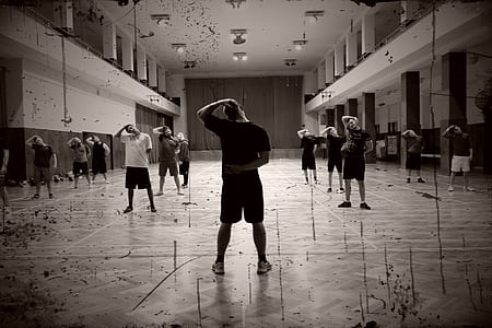 grayscale people stretching thumbnail