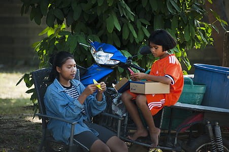 Two Girls Doning Hand Crafts thumbnail