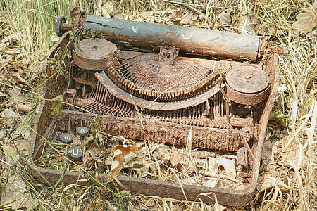 rusted vintage brown typewriter thumbnail