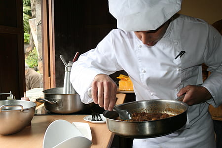 chef holding pot of food thumbnail