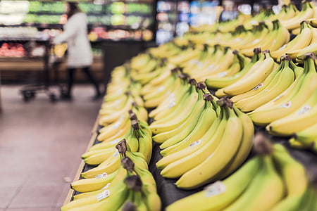 banana bunches on table thumbnail