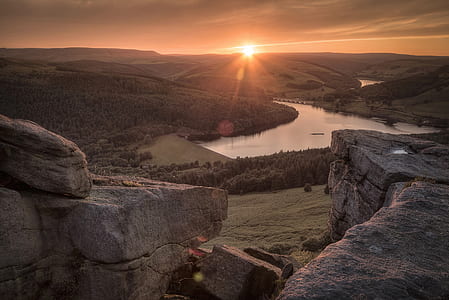 aerial photography of rock formation taken during sunset thumbnail
